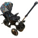 Tricicleta cu pozitie de somn, scaun reversibil, 8-36 luni cu 2 cosulete culoare negru/colorat